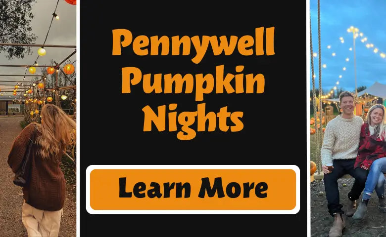 A woman walks through a pumpkin display at night, with string lights illuminating the path and a couple smiling nearby.